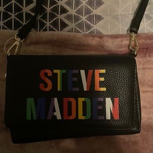 I am selling a Steve Madden purse. Worn once